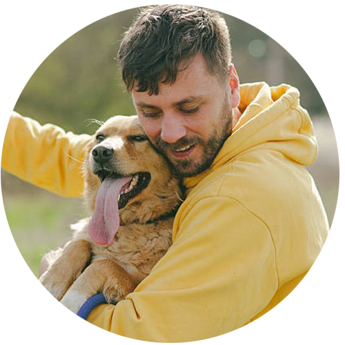 man with golden retriever